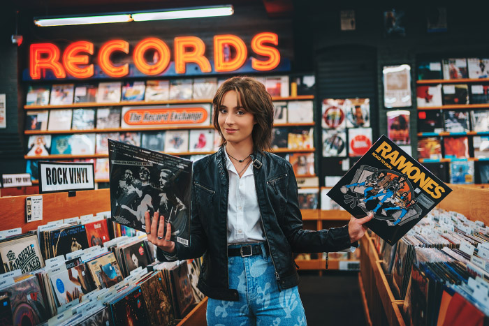 Teen girl at The Record Exchange record store in downtown Boise Idaho